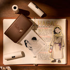 FaithTag F21 portable Bible journal printer with leather texture and gold cross button